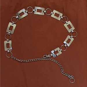 Vintage inspired silver metal waist chain, ring belt with clasp.